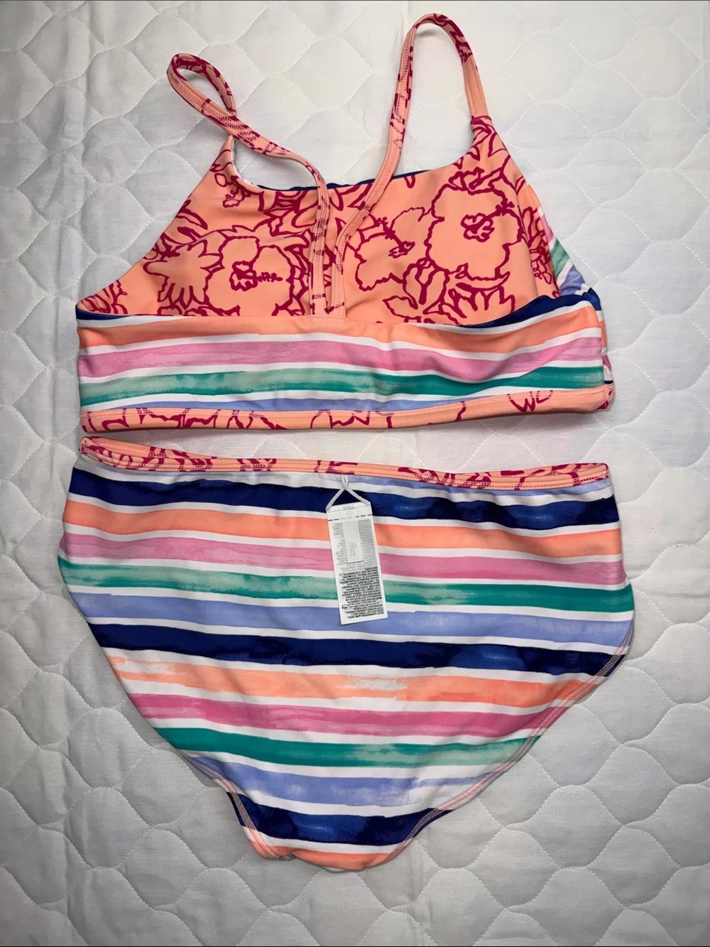 This Athleta Girl reversible bikini set high neck top and mid-rise bottoms